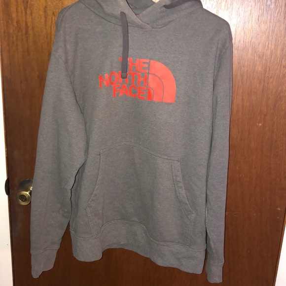 orange north face sweatshirt